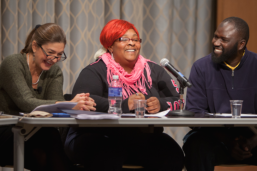 Photo of CARDS members, along with School of Nursing faculty, meet with the community.