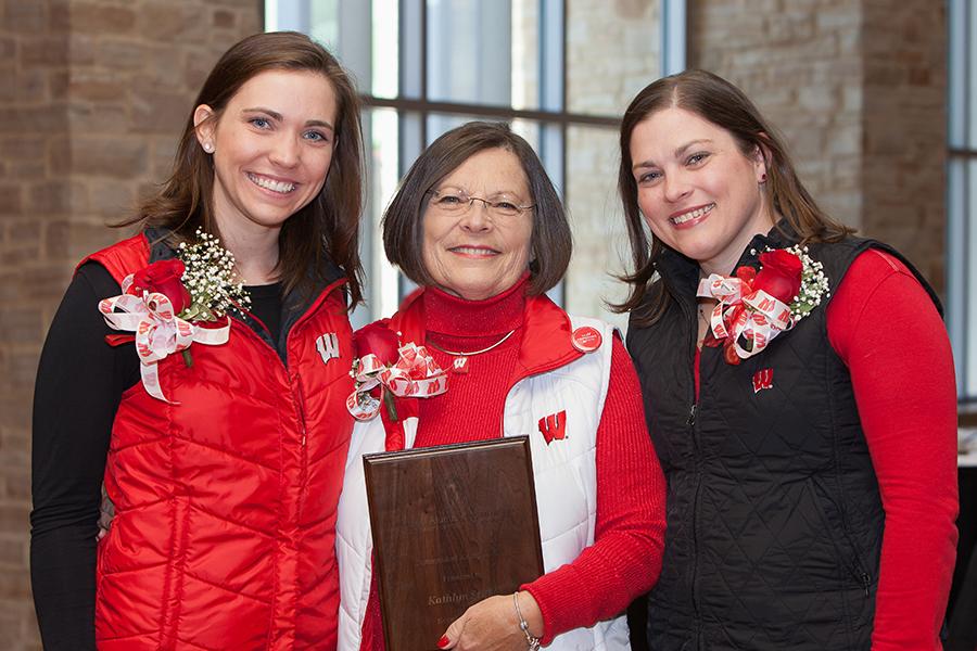 photo of an NAO Distinguished Alumni Award honoree with family, 2016