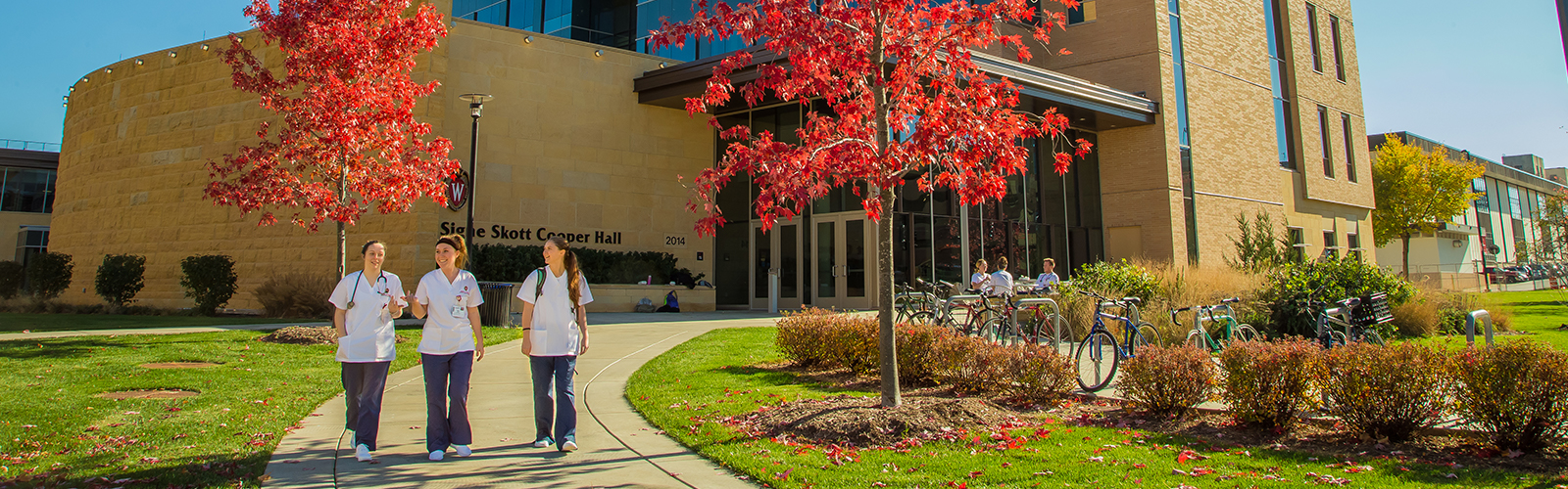 photo of nursing students walking in front of Cooper Hall