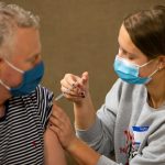 School of Nursing BSN student administers COVID vaccination